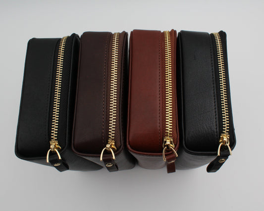 Pictured left to right: Vegan Ebony Leather Portfolio, Burgundy Leather Portfolio, Cognac Leather Portfolio, Ebony Leather Portfolio